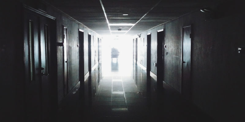Dark hallway, light at the end of it.